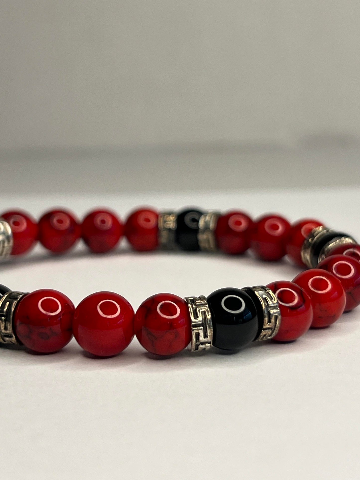 Garnet with Red Marble, Black Onyx and steel