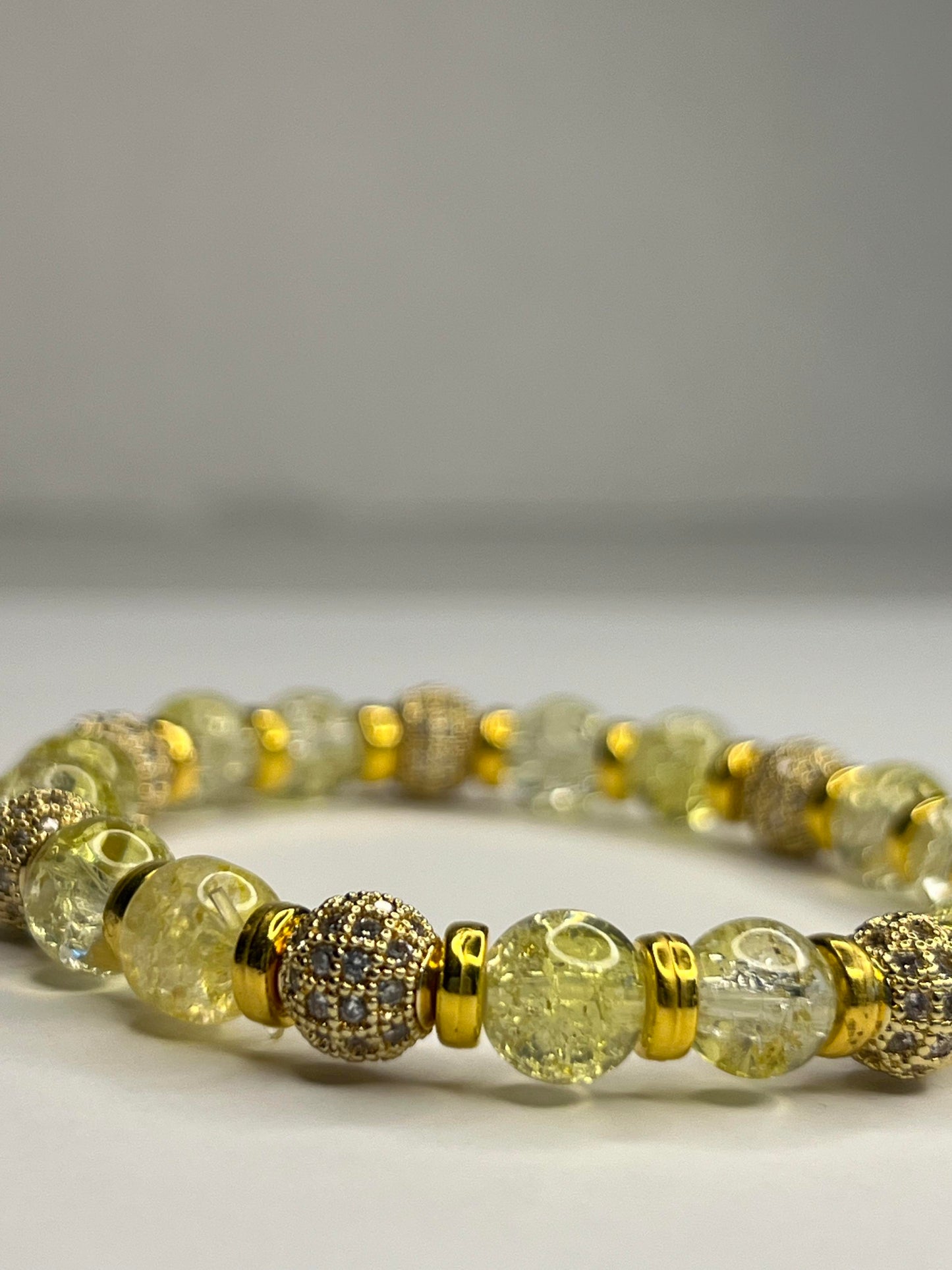 Quartz Crystal, Citrine, Rhinestone-studded natural beads, and Golden Stainless Steel