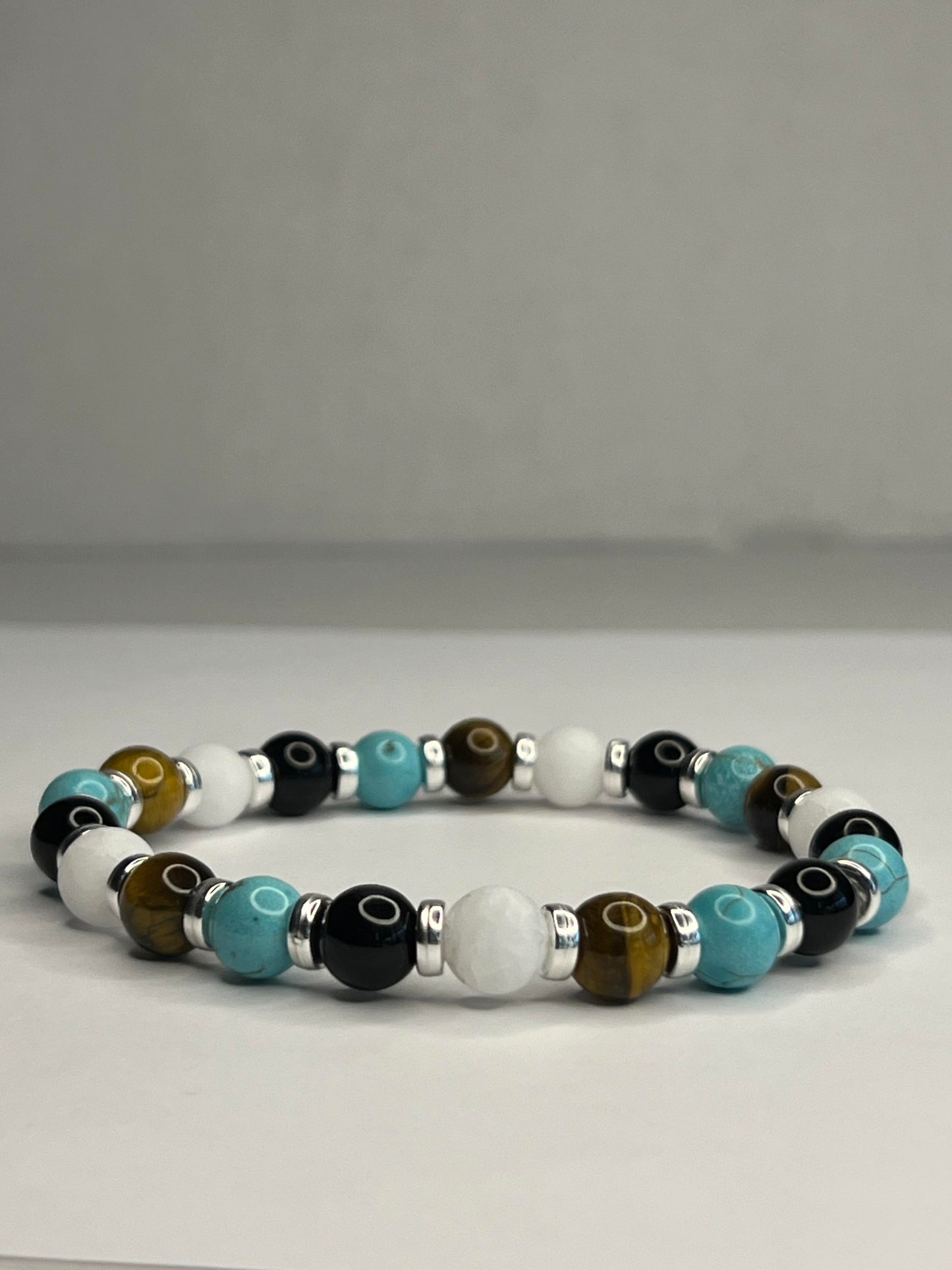 Turquoise and Yellow Tiger Eye with Onyx, Pure White Quartz and steel