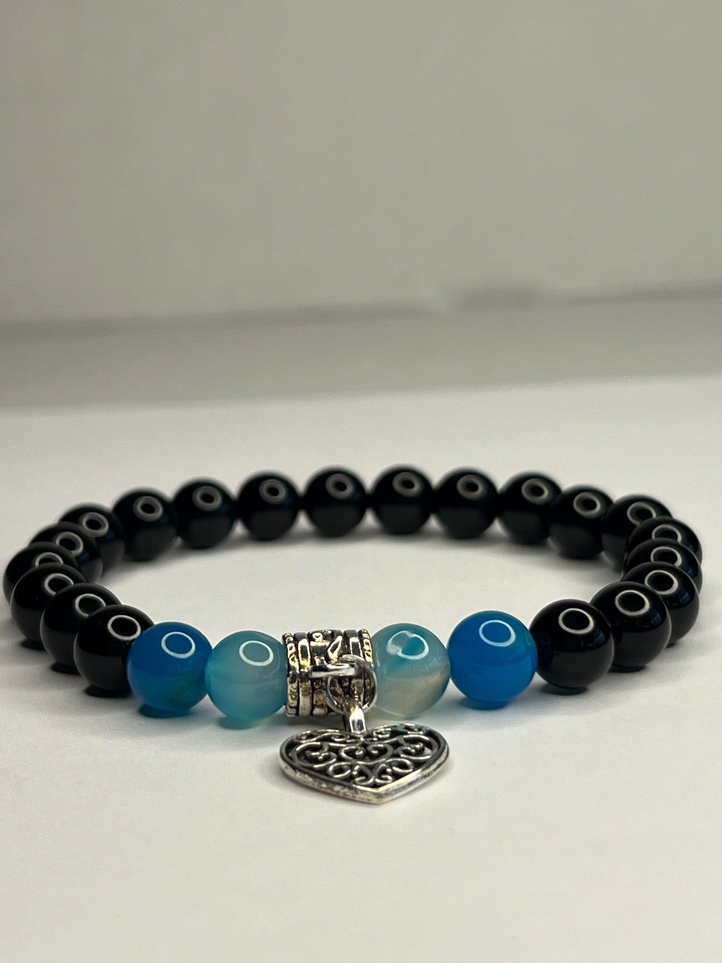 Obsidian and Blue quartz with steel heart charm
