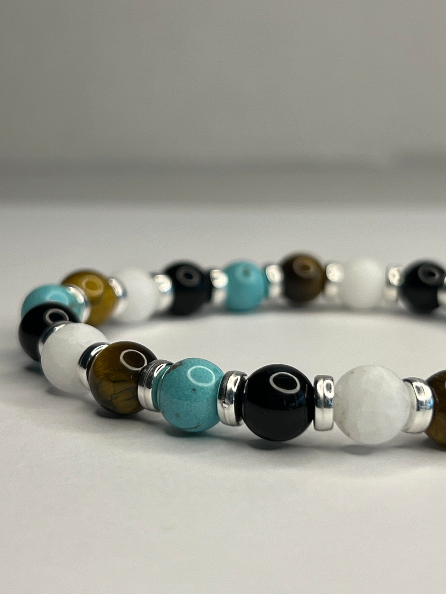 Turquoise and Yellow Tiger Eye with Onyx, Pure White Quartz and steel