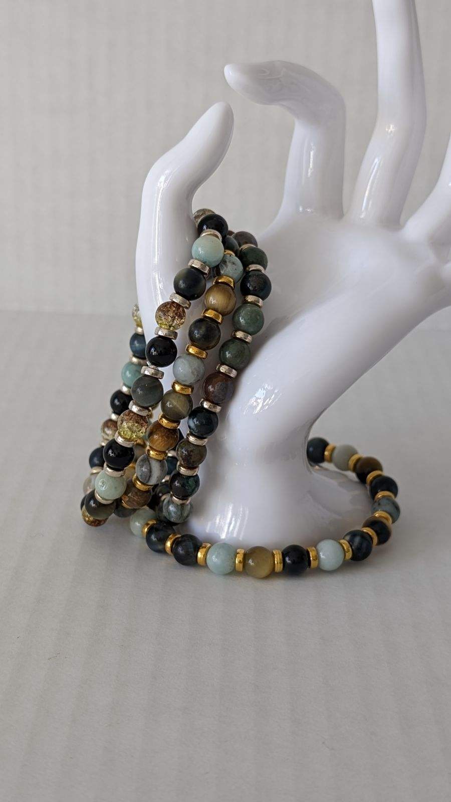 Citrine and Yellow Tiger eye, Pure white quartz, Onyx and Howlite with steel
