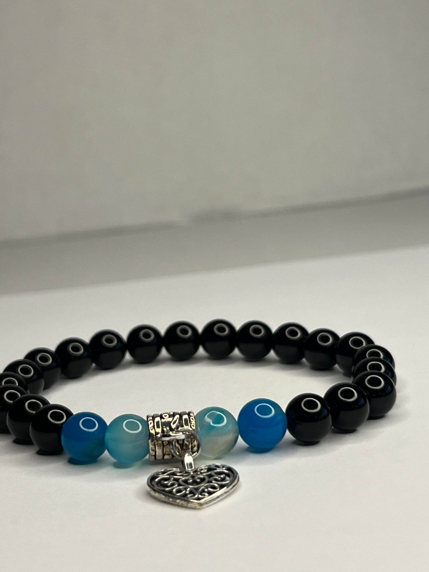 Obsidian and Blue quartz with steel heart charm