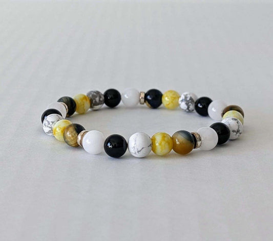 Citrine and Yellow Tiger eye, Pure white quartz, Onyx and Howlite with steel